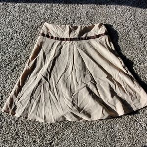 Tan skirt with brown ribbon bow